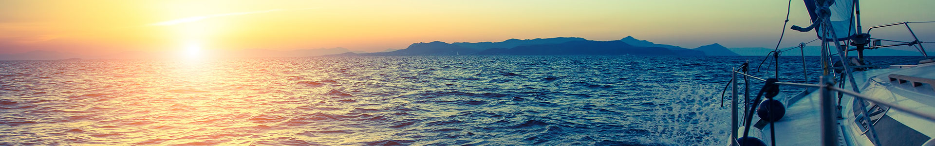 boat sailing at dusk